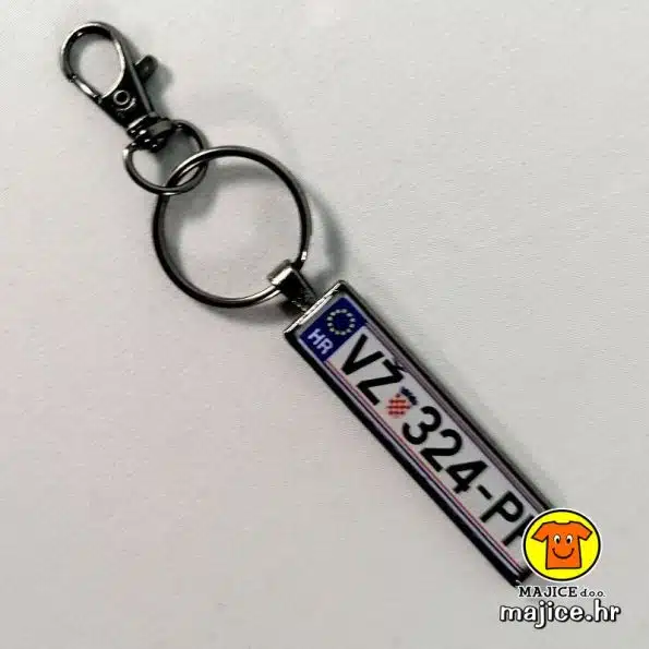 crno srebrni auto tablica privjesak